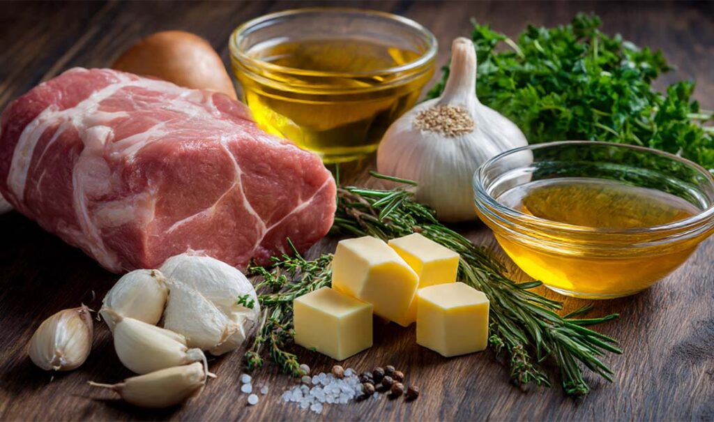 Alle Zutaten für Knoblauch Butter Kräuterbraten: Fleisch, Knoblauch, Butter, frische Kräuter, Salz, Pfeffer und Brühe